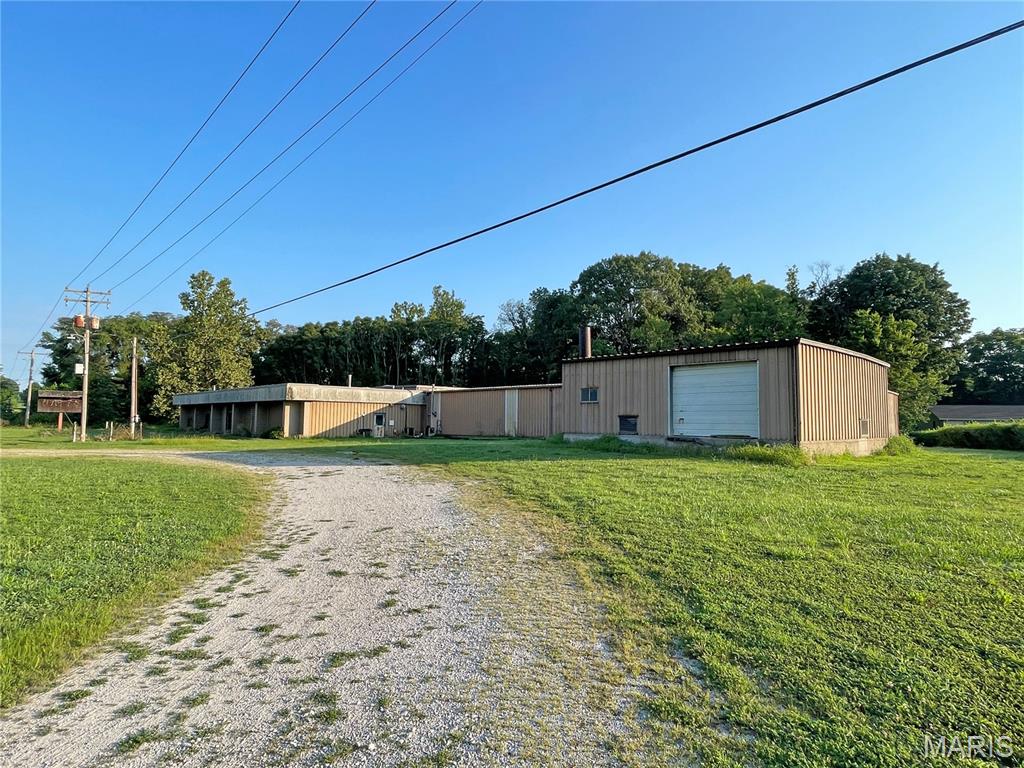 Situated on 2.76 +/- acres along a busy highway, this property offers excellent visibility and easy access. The 17,000 +/- square foot industrial building provides plenty of space and a flexible layout that can accommodate a variety of commercial, industrial, or mixed-use opportunities. Whether you're planning to renovate, repurpose, or develop something new, this property offers a solid foundation with plenty of potential to bring your vision to life.