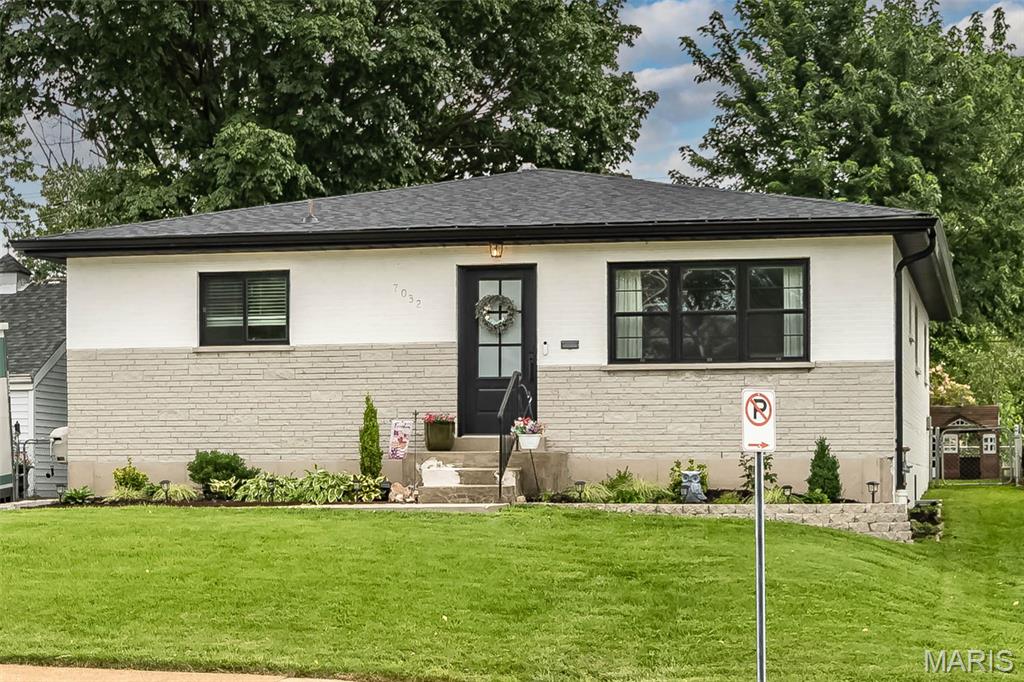 Welcome to 7032 Lansdowne Ave — a Beautifully updated 4 Bed, 3 Bath Home in the Lindenwood Park offering the perfect blend of modern farmhouse style and functional living space. From the moment you arrive, the freshly painted white brick exterior finished with Romabio limewash, black trim accents, and manicured landscaping create standout curb appeal. Inside, you’ll find an open and inviting layout with warm hardwood flooring, abundant natural light, and a stunning updated kitchen featuring white cabinetry, butcher block island, stainless steel appliances, and generous prep and storage space. The kitchen flows seamlessly into the dining and living areas, making the home ideal for both everyday living and entertaining. Custom built-ins and an electric fireplace added in 2024 create a cozy focal point in the main living space while adding both charm and functionality. The thoughtfully expanded bathroom addition provides added convenience and flexibility for modern living. With 4 spacious bedrooms, 3 full bathrooms, plus 2 bonus rooms perfect for a home office, playroom, gym, guest space, or additional living area, this home offers exceptional versatility to fit your lifestyle. Additional highlights include: New roof (2025) Detached 2-car garage Private driveway with ample parking. Updated modern farmhouse finishes throughout Move-in ready condition Located near parks, restaurants, shopping, and everything St. Louis Hills/Lindenwood Park has to offer, this beautifully maintained home combines style, space, and major updates in one incredible package.