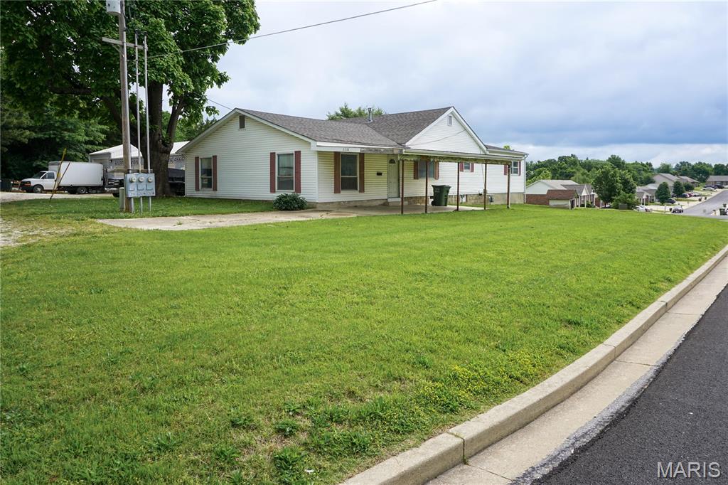 3 bedroom, 2 bathroom home situated on a 0.330 m/l acre corner lot at Maxwell and Old St. James Road. The home offers 2,456 m/l square feet of living space with a covered carport, natural gas heat, and washer/dryer hookups.

Property is priced to sell and is being sold as-is. The home is dated and will require updates and improvements, presenting an opportunity for renovation. Convenient corner location with plenty of potential for a buyer looking to make it their own.