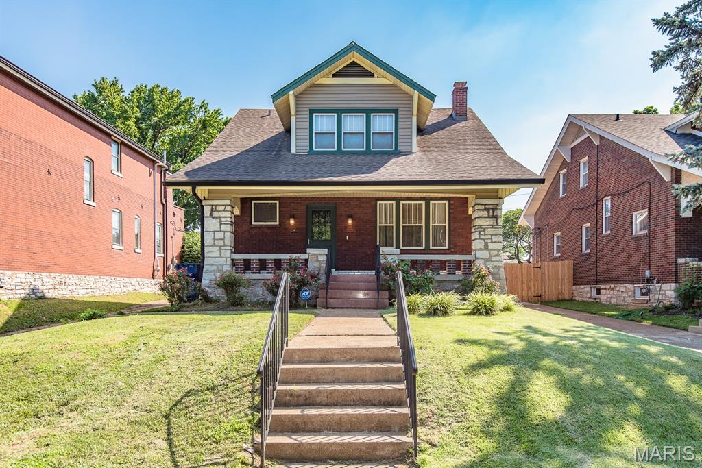 Welcome to 3666 Loughborough Ave, this charming 3 bed, 2 bath brick home is located just steps from historic Carondelet Park and offers classic St. Louis charm throughout, including beautiful stained glass windows and arched doorways. A wonderful front porch welcomes you home, perfect for relaxing and spending a beautiful evening outside. Inside you'll find abundant natural light, gleaming wood floors, a cozy brick fireplace, and a modern kitchen ready for your next gathering. All three bedrooms offer ample closet space, and the basement provides plenty of storage along with a couple of flex rooms that are perfect for a home office, gym, or hobby space. Outside, enjoy an ample backyard and an oversized 1 car garage with a workshop area. With easy access to I 55 and nearby shopping, this one won't last long!