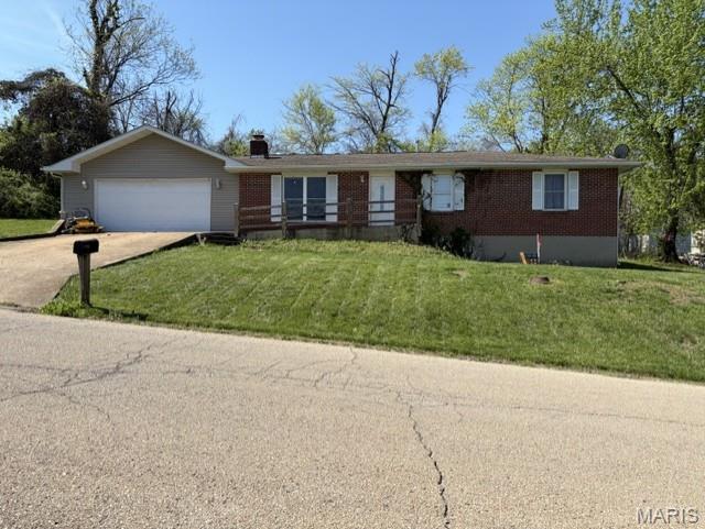 Cozy + space + opportunity at 298 Nicholson Dr in Potosi, MO! This 3 bed, 2 bath ranch offers 1,242 sq ft, a wood-burning fireplace, 2-car attached garage, and sits on THREE city lots—giving you room to grow and added privacy.

With a functional layout and a little TLC, this home is perfect for buyers or investors looking to build equity. Convenient location with a peaceful feel.

Homes with this much space and character sell fast - schedule your showing today!
