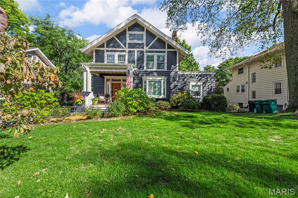 Welcome to 368 S. Gore Avenue, a timeless 5-bedroom, 3.5-bath home offering 3,338 sq. ft. of beautifully maintained living space in the heart of Webster Groves. Perfectly positioned on the beloved Fourth of July parade route, this property blends classic character with modern updates and an unbeatable walkable location near schools, parks, restaurants, and shopping.  Step inside to a welcoming main level featuring original hardwood floors, abundant natural light, and architectural details throughout. The inviting living room with fireplace and built-in shelving flows seamlessly into the formal dining room, perfect for entertaining. A beautifully updated kitchen offers custom cabinetry, stainless steel appliances, a large center island, and plenty of prep space, while a spacious family room and powder room complete the main floor.  Upstairs, the primary suite offers generous closet space and a private ensuite bath. Two additional bedrooms and a full hall bath complete the second floor. The third floor provides two more spacious bedrooms and another full bath.  The lower level adds even more versatility with a finished bonus space perfect for a gym, media room, or playroom, plus ample storage. Outside, enjoy a private backyard ideal for entertaining or relaxing, along with a detached two-car garage for added convenience.  With a prime location on one of Webster’s most cherished streets, this home offers the rare opportunity to enjoy historic charm, modern comfort, and a vibrant community lifestyle all in one. Don’t miss the chance to make 368 S. Gore your forever home.