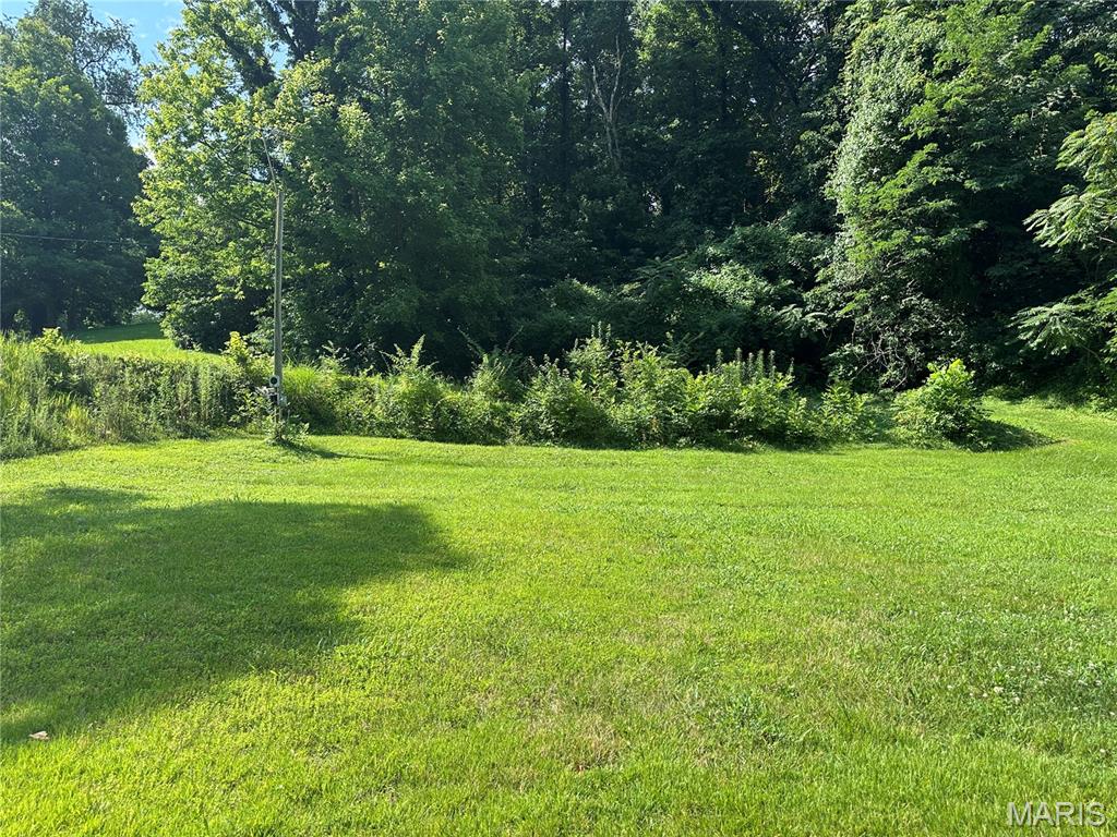 This  vacant lot is .60 acres and is located in Villa Hills in St. Clair County not the city. The lot is buildable and double wide/manufactured homes are allowed with approval from the county.  The manufactured home must have a permanent foundation.  All utilities available at the street.  Buyer and buyer's agent to verify all information.  Please check with St Clair County for any building restrictions or permits needed.