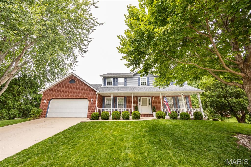 Welcome to 130 Hodgens Mills Lane in the heart of O’Fallon! This spacious home offers a functional layout with multiple living areas, generous room sizes, and great curb appeal. Enjoy relaxing on the inviting covered front porch or entertaining on the maintenance-free back deck overlooking the backyard. The kitchen opens nicely to the main living space and features plenty of cabinet and counter space. The primary suite includes a private bath with both a separate tub and shower, creating a comfortable retreat at the end of the day. The finished lower level adds even more flexible living space perfect for a second family room, recreation area, home office, or workout space. Additional features include a fireplace, ample storage, and a convenient location near shopping, restaurants, schools, and Scott Air Force Base. Move-in ready with space to spread out both inside and out!  Please note: Audio and video surveillance are in use on this property. Buyers & Buyer’s agents are responsible for verifying accuracy of all MLS data.