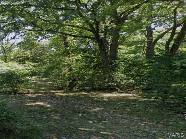 Nestled among mature trees in the Turkey Mountain Estates #2 subdivision, this approximately 14,941 sq. ft.
property offers a peaceful setting and an opportunity for a new owner. A manufactured/mobile home is
located on the property; however, the seller makes no representation as to whether the home has been
converted to real property. Property is being sold AS IS, WHERE IS, with CASH OFFERS ONLY. The
value is in the land. Buyers are strongly encouraged to conduct their own due diligence regarding the
condition of the improvements, utilities, zoning, title status of the manufactured home, and all other matters
material to their purchase.