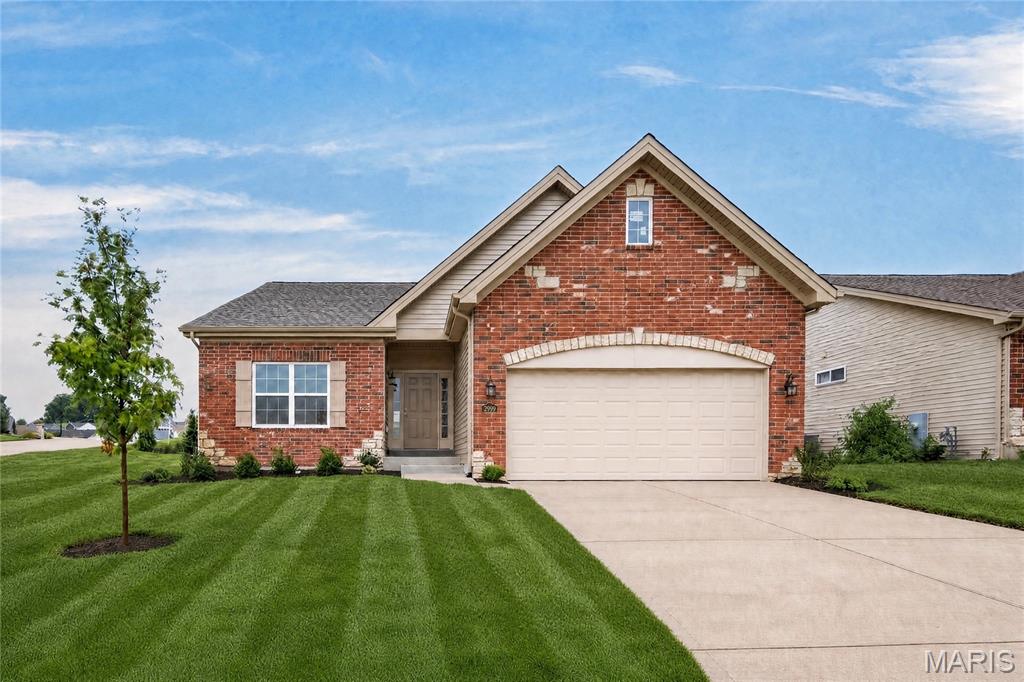 Move In Ready, New Construction! Be the first owner of this impressive, low maintenance, free standing villa by Bridgewater Communities in the beautiful Villas at Weber Farms neighborhood in Washington!  This quiet, established neighborhood offers small town charm with modern conveniences located nearby.  Offering low maintenance luxury designed and built for today’s buyers and their most desirable features and finishes.  The curb appeal is excellent with a brick front elevation, stone accents, architectural shingles, garage coach lights, lawn irrigation, professional landscaping, and full yard sod.  Features include 2 bedrooms, 2 bathrooms, 1,600 sq feet of open living space, an oversized 2 car garage, luxury vinyl plank flooring in the main living areas, 9 foot ceilings throughout, a Deluxe Kitchen, 42 inch cabinets with crown molding, custom cabinet features including soft close, quartz countertops,  island with seating bar,  pendant lights, recessed lighting, under cabinet lighting, stainless steel appliances, chimney style range hood, electric range, microwave, dishwasher, designer tile backsplash,  gas fireplace, custom trim, main floor laundry (accessible from the hallway or Primary Bedroom), luxury Primary Bath with split raised height vanities, comfort height commodes, marble shower with seat in the Primary Bath, luxury vinyl tile in the bathrooms, walk in closet, 32 inch interior doorways, Low E windows, upgraded carpet and pad in carpeted areas, 12x12 composite deck, egress window in the basement, rough in bath, garage door opener and more.  A low monthly fee pays for lawn care, lawn irrigation system including water, snow removal of over 2 inches (per indentures) and some insurance.  This amazing villa has easy access to Highways 47 and 100. Quality construction by the villa experts at Bridgewater Communities, beautiful neighborhood and fantastic features!