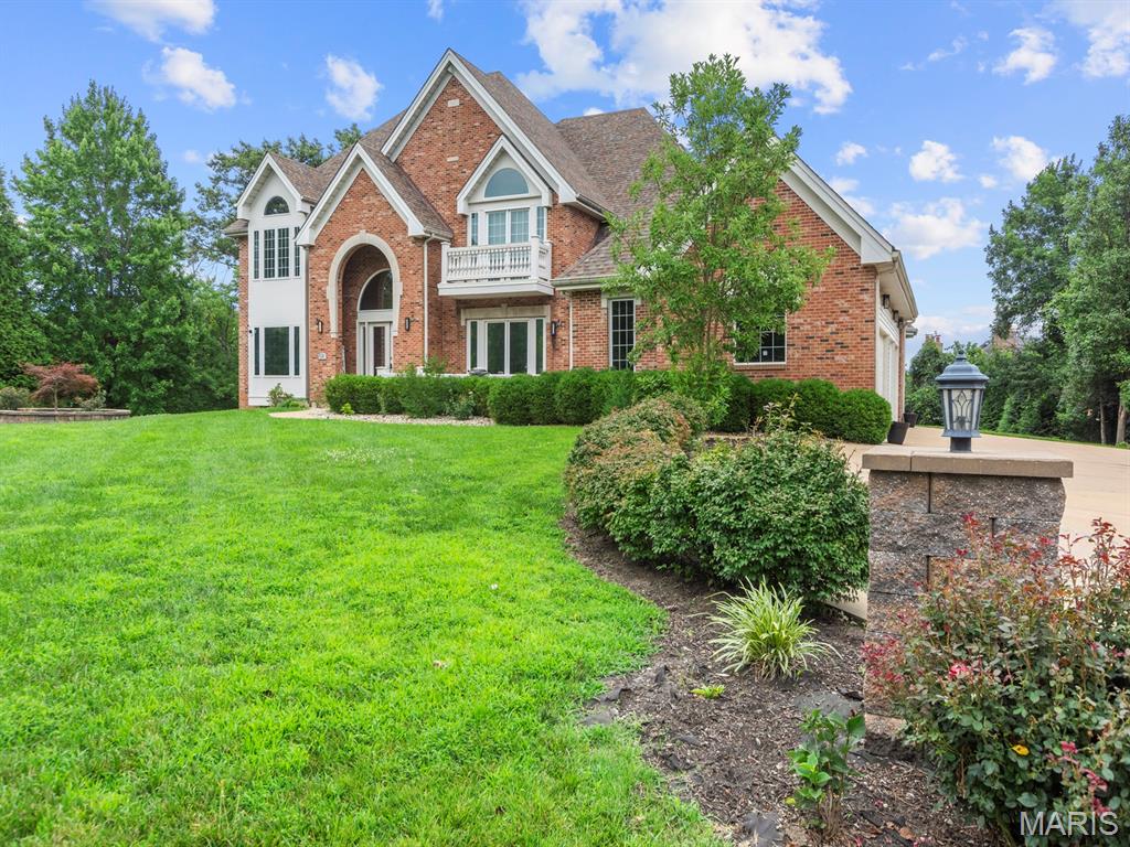 Welcome to 360 Laduemont Drive in the prestigious Ladue Conway Estates subdivision of Creve Coeur. Perfectly situated on an impressive nearly one-acre lot, this picture-perfect home offers luxury, comfort, and exceptional spaces designed for both everyday living and unforgettable entertaining.

From the moment you enter, you'll appreciate the beautiful hardwood flooring, elegant tile work, and timeless finishes throughout. The thoughtfully designed floor plan features 4 spacious bedrooms, 5 full bathrooms, and 3 half bathrooms, providing abundant space for family and guests.

Whether you're hosting indoors or out, this home was built to impress. Multiple expansive patios create the perfect outdoor retreat for relaxing or entertaining while overlooking the beautifully landscaped grounds. Inside, the dedicated theater room provides the ultimate setting for movie nights and game-day gatherings.

Car enthusiasts and hobbyists will love the impressive 4-car garage, offering ample room for vehicles, storage, and workspace. Additional updates include a roof approximately 10 years old, new air condition (s), providing added peace of mind.

Located in one of Creve Coeur's most desirable neighborhoods, this exceptional property offers an ideal combination of elegance, privacy, and convenience with easy access to shopping, dining, hospitals, parks, and major highways.

This is a rare opportunity to own a stunning home in sought-after Ladue Conway Estates—where luxury living meets an unbeatable location.