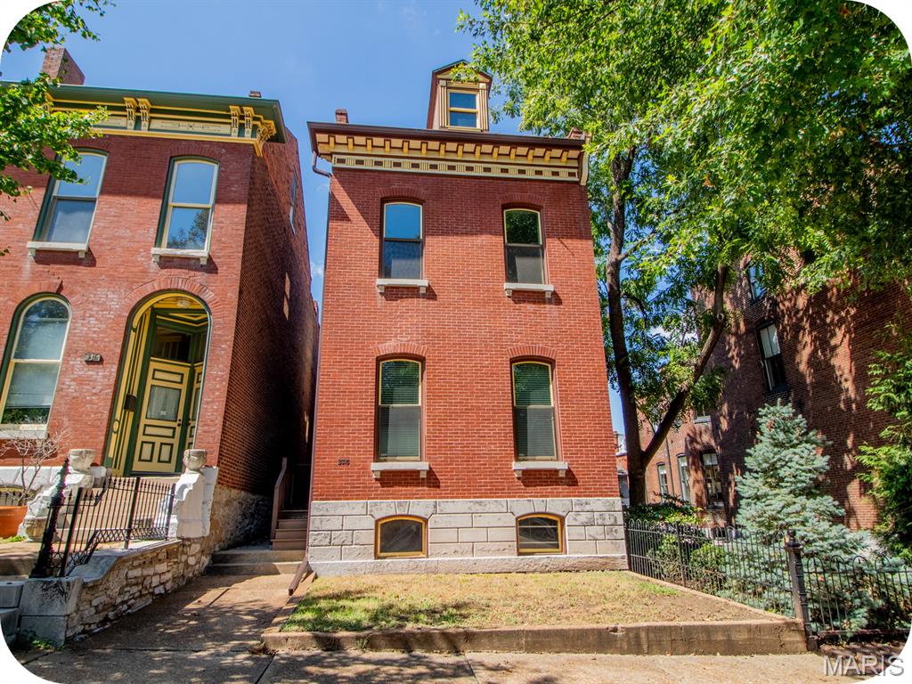 Own your own place, build equity & still have money left over for beers, burgers & everything else that makes Soulard so much fun. This historic 2-family is just a quick golf-cart ride from all your favorites—from happy hours on McGurk's patio to Sunday coffee at Protagonist/Antagonist, plus plenty of spots to catch the game, grab a drink & meet up with friends. This property isn't going to eat your weekends or surprise you with a never-ending list of repairs. The building was completely renovated around 2013, making it about as easy to own & maintain as it gets. Move in, settle in & start enjoying the neighborhood instead of spending every Saturday working on your place. The building has two spacious 1-bedroom apartments, one on each floor. Both offer comfortable living rooms, huge eat-in kitchens, oversized bathrooms with double sinks, convenient in-unit laundry & large private bedrooms with double closets. There's also an unfinished basement for all the stuff you don't want taking up space upstairs, plus a 2-car parking pad out back. Outside, the private yard & patio are made for fall hangs, football games & nights around a fire with friends. And here's the best part: you can own your own home without stretching your budget to the breaking point. Live in one apartment & rent the other to help offset the mortgage, or rent both & build your investment portfolio. Either way, you're buying a property that lets you enjoy everything Soulard has to offer while building equity—not spending your free time & money fixing up an old house. Want more info? Skip the Zillow rabbithole & reach out to me, the listing agent, directly for more info or to schedule a tour.
