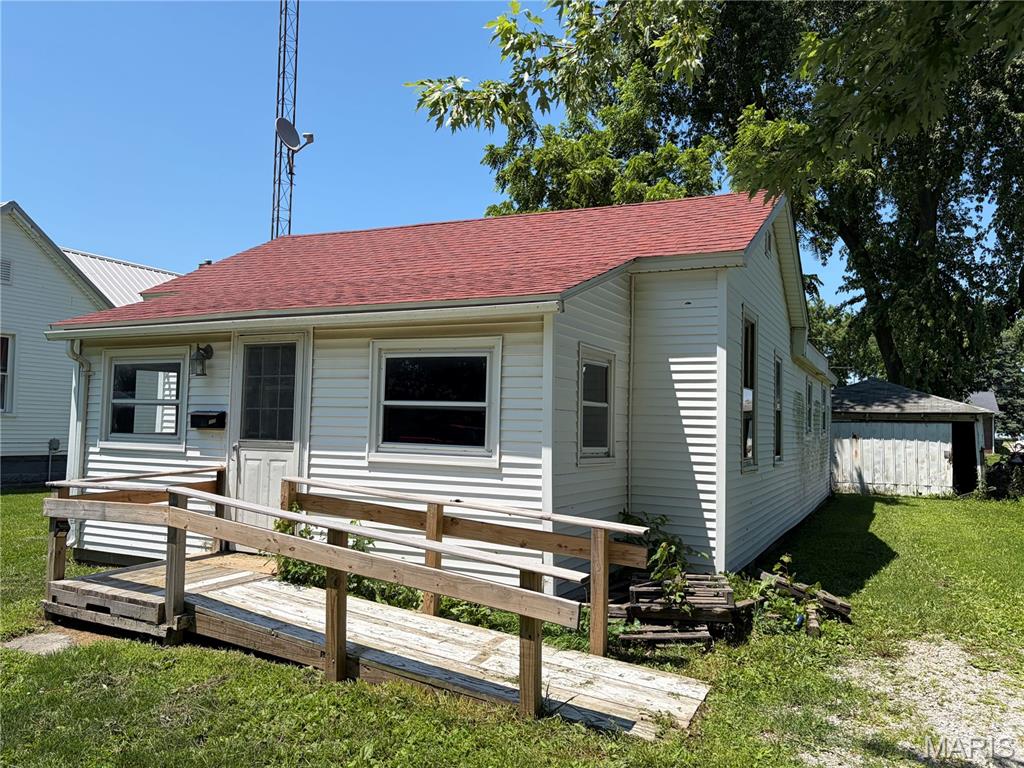 CONTINUE TO SHOW PENDING INSPECTIONS! Seller will accept backup offers!  BUDGET BUNGALOW!  This property needs a bit of TLC, but would make a great investment or starter home.  2 bedrooms with a bonus room that could be used as a third bedroom, enclosed front porch, ramp to front entry, washer, dryer, and kitchen appliances included.  All personal property left by seller at time of closing will become the property of the buyer.  Furnace and hot water heater replaced in 2021.  Selling AS IS, no CFD or rental.