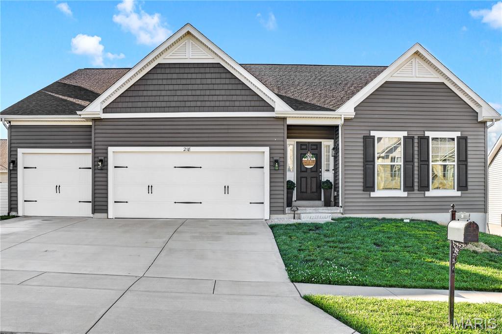 Stylish, spacious, move-in ready and only 5 years young! 

Welcome to 218 Carlton Point Dr., where thoughtful design and comfortable living come together in one impressive package. This beautifully maintained ranch home offers 4 bedrooms, 3 full baths, and a 3-car garage, with plenty of space for both everyday living and entertaining.

Step inside to an inviting open floor plan filled with natural light and comfortable gathering spaces. The main level provides the convenience of single-level living, while the finished lower level expands your options with an additional bedroom, full bath, and versatile living area perfect for movie nights, game days, a home office, or guest accommodations. 

Outside, enjoy your backyard featuring a  spacious deck, ideal for morning coffee, summer BBQs, or unwinding after a long day. Whether you're hosting family and friends or simply enjoying a quiet evening outdoors, this home offers the perfect setting.

Located in a desirable Wentzville community with convenient access to schools, parks, shopping, and dining, this home checks all the boxes. Don't miss your chance to own this home!