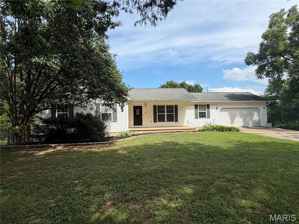 Don’t miss this beautiful 5 bedroom 3 bathroom home in a beautiful country setting! Just 10 minutes to Ft Leonard Wood front gate, 2 miles m/l to the beautiful Gasconade river access. Enjoy this great location and watch the deer and wildlife from the back deck.   This home's main level has a nice living room, dining room, kitchen, laundry, 3 bedrooms, and 2 bathroom to include the master suite including a jacuzzi tub.  Downstairs find a newly finished family room, 2 additional bedrooms, bathroom and a second laundry area! That’s right, laundry on both levels!! Walk out to the quiet back yard great for entertaining or relaxing with a nice fenced area. Don’t miss this amazing house on 1 acre +/- ready to move in and make your own!   "Owners are also offering a flooring allowance for the carpeted bedrooms."