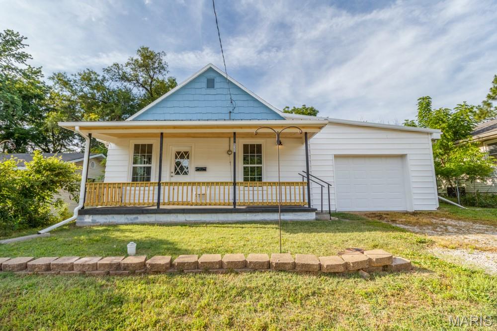 Welcome home to this beautifully updated cottage-style residence that perfectly blends timeless charm with modern improvements. From the moment you arrive, you'll appreciate the inviting curb appeal and the peace of mind that comes with knowing the major updates have already been completed. Extensively remodeled throughout, this home features a new roof, new HVAC system, new flooring, fresh interior paint, new trim work, and energy-efficient Quaker windows, creating a stylish, comfortable, and truly move-in-ready living space. Natural light fills the home, highlighting the fresh finishes and thoughtful updates found throughout. Inside, you'll find a warm and welcoming atmosphere where modern upgrades complement the home's cozy cottage character. The new flooring flows seamlessly from room to room, while the fresh paint and updated trim provide a clean, contemporary look. Every detail has been carefully considered to create a home that is both attractive and functional. In addition to the beautifully remodeled interior, the property offers a large garage that provides exceptional storage space for vehicles, tools, outdoor equipment, hobbies, or workshop needs. Whether you're looking for extra room for projects, seasonal items, or simply additional organization, this spacious garage is a valuable feature that adds both convenience and versatility. The comfortable living spaces are ideal for everyday living and entertaining, while the extensive updates mean less maintenance and more time to enjoy your home. Perfect for first-time buyers, those looking to downsize, or anyone seeking a turnkey property, this home offers the ideal combination of charm, quality, and practicality. With the major improvements already completed and ample storage available, all that's left to do is move in and make it your own. This beautifully renovated cottage-style home is a rare opportunity to enjoy modern comfort, classic appeal, and added functionality in one exceptional package. Schedule your private showing today and see firsthand everything this move-in-ready home has to offer.