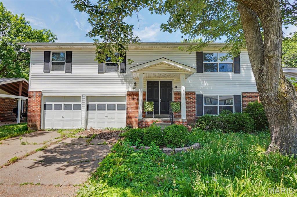 Opportunity, potential, and value come together in this Florissant split-level home. Located in a quiet, very popular neighborhood, this 3-bedroom, 2-bath property offers an excellent chance for investors and owner-occupants alike. Previously rented for $1,600 per month, the home has a proven rental history and a clear path to increased value through renovation.
Inside, you'll find a functional split-level layout featuring a spacious living room, dining area, bright kitchen, three generously sized bedrooms, and two full baths. The property also includes a two-car garage and ample outdoor space for entertaining, recreation, or future enhancements.
AC, water heater and roof are just 9-10 yrs old. All appliances stay.  The After-Repair-Value of this home is $225k+. Whether you're an investor seeking a value-add rental property, a quick fix-and-flip or a homeowner looking to personalize a home to your taste, this property offers flexibility, upside potential, and attractive pricing.  This listing sat on market previously due to the presence of mold which has since undergone full remediation at a cost of over $12k. Don't miss this opportunity to create value and make this home your own or to take on your next investment project  — schedule your showing today!  SEE LINK FOR VIRTUAL TOUR!