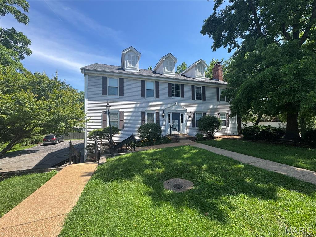 Build in 1980, Beautiful 2nd floor condo in University City. Great location close to downtown Clayton, Delmar and walk to Deweys Pizza, Starbucks and more and pretty landscaped grassy area outside the buildings.  huge living room with vaulted ceiling and gas fireplace. Nice kitchen has updated cabinets and granite countertops. All stainless appliances stay!  Hardwood floor through out for the house. bathroom has double sinks with granite counters, tile floors and separate shower and commode room. Private laundry and storage room with full sized washer and dryer.  New roof intalled May 2025,New electric panel Oct 2025, New HVAC April 2024, Water heater April 2024,  All appliances replaced 2018, Hardwood floor installed 2018.  2 bedrooms, with deep oversized closet. Unit comes with the high coveted TWO GARAGE spots -one is the attached garage and 1 under the adjacent  805 building. vinyl thermal windows throughout, 6 panel doors. Private enclosed storage unit in the basement. Location: End Unit, Upper Level. Easy to show!