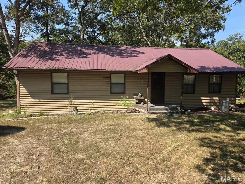 Opportunity awaits with this 3-bedroom, 2 full bath manufactured home situated on 2.49 acres of peaceful countryside. Offering plenty of space both inside and out, this property provides a great setting for those looking to enjoy rural living with room to roam, garden, or simply relax and take in the surroundings. The home features a functional floor plan with a spacious living area, adequate sized bedrooms, and ample outdoor space for recreation, pets, or future improvements. A detached workshop/garage provides the perfect space for hobbies, projects, equipment storage, or parking, while the additional utility shed offers even more storage for tools and outdoor essentials. Whether you’re looking for an investment property, a starter home, or a place to make your own, this acreage offers endless potential and the opportunity to create your ideal country retreat.