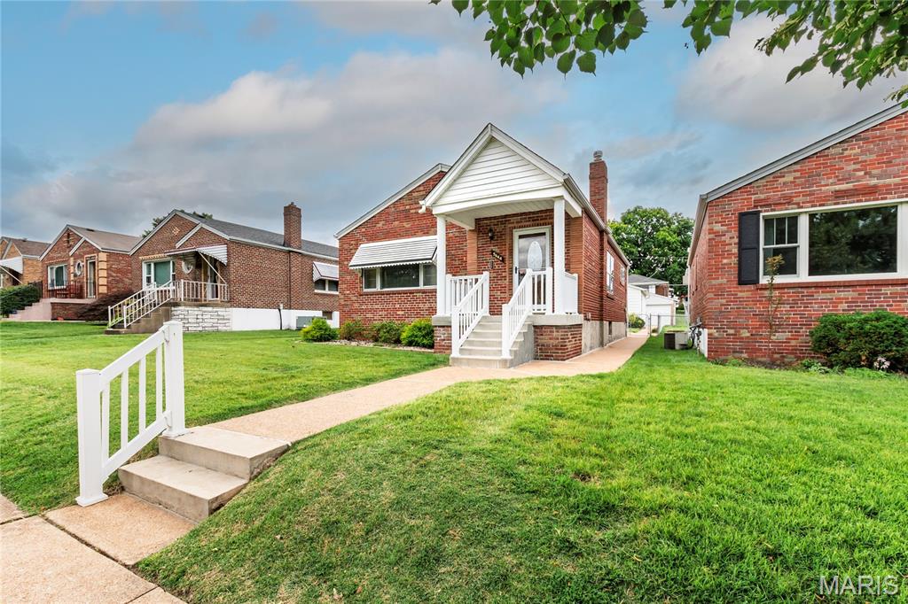 Lovingly maintained by the same owners for more than 60 years, this charming all-brick and stone bungalow is ready for its next chapter! Featuring 2 bedrooms, 1 full bath, and a warm, inviting floor plan, this home offers the perfect opportunity for a new owner to add their personal touches while enjoying the many updates already completed. Recent improvements include a roof less than one year old, newer furnace and central air, and an updated electrical panel. The cozy family room addition off the kitchen provides additional living space and offers direct access to the patio and fenced backyard—ideal for relaxing, entertaining, or gardening. The welcoming covered front porch with maintenance-free railings adds wonderful curb appeal and a great place to enjoy your morning coffee. The partially finished lower level offers abundant storage, additional living space potential, and convenient walk-out access to the backyard. The refrigerator, washer, and dryer are all included, making the move even easier. A detached one-car garage and ample street parking provide plenty of parking options. Located within walking distance of beautiful Tilles Park, this home offers a fantastic location with easy access to recreation, walking trails, and community amenities. Property is being sold AS IS - price is reflective - Occupancy permit and any required municipal inspections will be the responsibility of the buyer for the convenience of the heirs, not denoting the condition of the home. Don't miss this opportunity to own a well-cared-for home with great bones, timeless character, and endless potential!