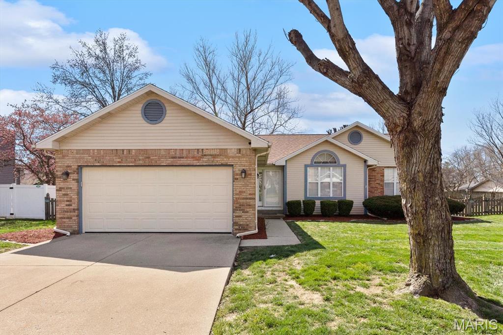 Looking for one level living in the heart of O'Fallon with a NEW roof in 2025, HVAC NEW in 2024 and with UV air filter that is serviced by Archway, NEW water heater in 2024, carpets and vinyl floors replaced in 2020, storm door, front door, sliding door and kitchen window replaced in 2024, and new siding on the west side of the home in 2025? Here it is! Inside you'll find a foyer entry, vaulted ceilings, fireplace, dining area and living room. The eat in kitchen has plenty of counter top space, breakfast area, and pantry closet. The main floor laundry closet is conveniently located near the two guest bedrooms and full guest bath. The primary bedroom has a vaulted ceiling, walk in closet, and a 3/4 primary bath with double bowl vanity and an updated 3/4 shower insert. Enjoy the fenced yard from the deck and lots of storage in the shed or attached 2 car garage! Don't miss this conveniently located home near shopping, I64, and minutes to Scott Air Force Base!