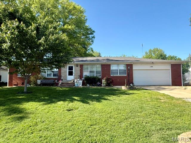 Located in New Baden, this spacious 4-Bedroom, 2-Full Bath Home offers over 1,800 sq. ft. of living space and a convenient attached 2-car garage.  With a full, unfinished basement, this property provides plenty of space and endless possibilities.  Whether you're seeking a home where you can add your own personal touch or an investor looking for your next opportunity, this property offers solid potential in a desirable community.  The home is located directly across from the New Baden Community Park and Pool.  Property is being sold "AS-IS" with the seller making no repairs.