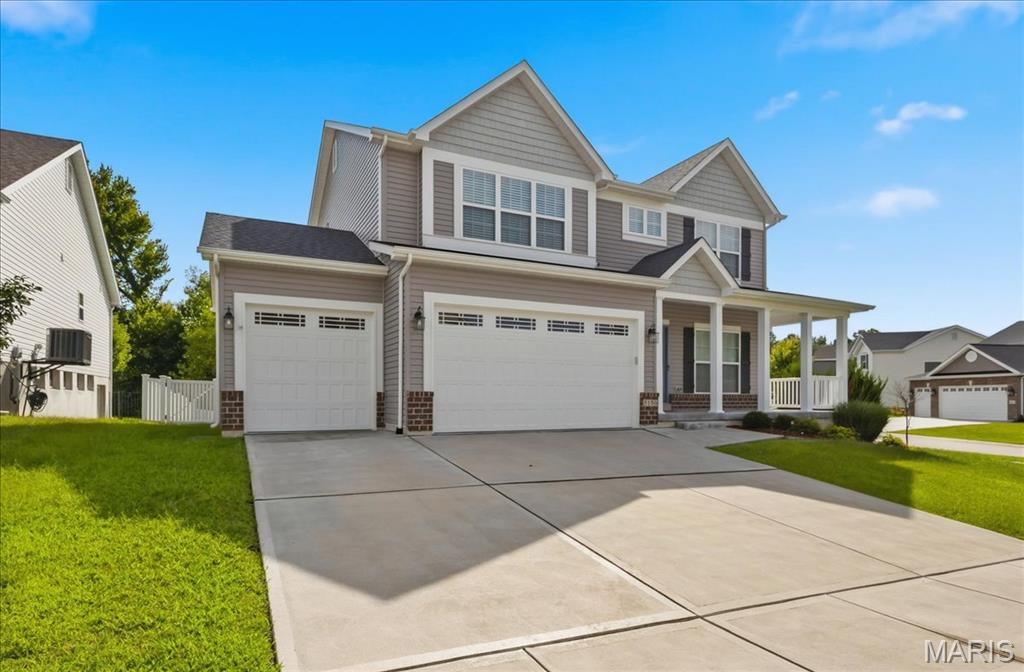 Meticulously cared for Flower and Fendler build on an oversize corner lot!  This 2-sty spacious home still looks like it was built yesterday.  Curb appeal is impressive with brick accents, tasteful landscaping, 3-car oversized garage (with 8 ft doors) & covered front porch. Walk into a bright, open and functional floorplan w/9 ft ceilings, neutral colors, wood look low maintenance laminate flooring & natural light.  Entry foyer is flanked with a formal dining room & staircase w/metal balusters. Gourmet style kitchen is improved with 42 in cabinets, SS appliances, quartz countertops, center island, recessed lighting, electric range/oven & breakfast room.  Family room includes a wall of windows, ceiling fan & gas FP.  Main floor laundry room, 1/2 bath& butlers pantry.  Upstairs is a large MB suite with walk-in closet, luxury master bath with dual vanities, separate tub/shower, & 3 additional BR’s sharing two full baths.  LL is ready for finishing with 9 ft pour, rough in & egress window.  Homeowner improvements & builder upgrades are lengthy and include an irrigation system, vinyl fenced in yard, water softener, zoned HVAC, 6 panel doors, concrete patio & 30 year architectural shingled roof.  Walking distance to Eureka Elementary & the Eureka library, walking paths, direct access to Greensfelder & so much more!  Skip the build time & premium price tag of new construction!