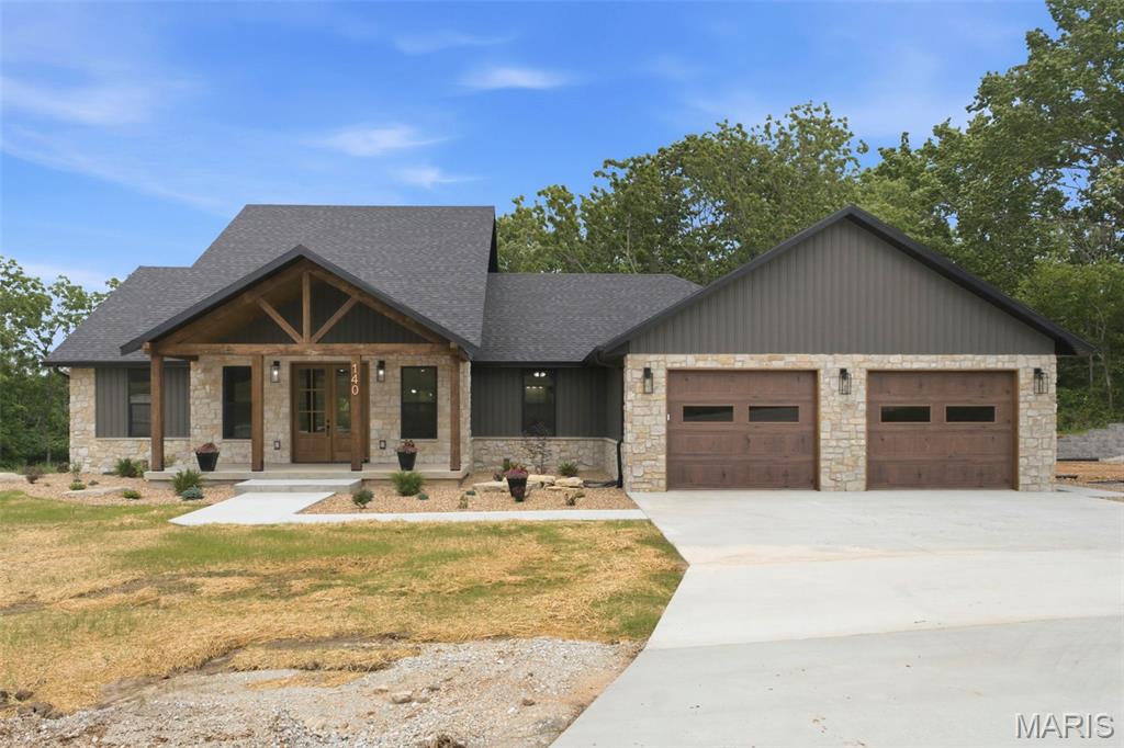 New Construction Custom Home for Sale in Cabool, MO. Located in a new subdivision on over an acre of land is where you will find this quality home including upgraded features throughout and attention to detail everywhere you look. Home boast 5 bedrooms, 3 1/2 bathrooms, two living areas and oversized deep 3 car attached garage. The beautiful double front doors welcome you into the grand living room with high ceilings and wood accents. The kitchen with granite countertops includes all stainless-steel appliances and a HIDDEN pantry that is sure to please with butcher block countertops. The primary bedroom and bathroom connect to the laundry area from the closet for convenience. Upstairs there is a bedroom, bonus room and full bathroom. Rounding out this amazing property is a beautiful beamed front porch with view of the lake and back deck for viewing nature. There is also a walking trail for your enjoyment. You don't find special homes like this every day. Call to view today.