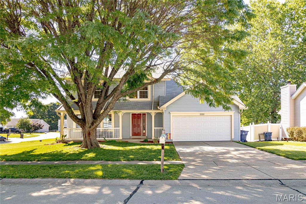 Welcome home to this beautifully maintained and thoughtfully updated 2-story nestled on a spacious, fenced corner lot in a quiet enclave of just 19 homes. Offering 3 bedrooms, 2.5 baths, and approximately .24 acres, this home combines timeless charm with modern updates designed to be enjoyed for years to come.

From the moment you arrive, you'll be captivated by the stunning mature shade tree, inviting covered front porch, and exceptional curb appeal. Whether enjoying your morning coffee or relaxing after a long day, the porch provides the perfect place to sit back and take in the neighborhood.

Inside, the updated kitchen features solid surface countertops, newer appliances, and flows seamlessly into the breakfast room and family room, creating an open and inviting space ideal for everyday living and entertaining. Throughout the home, you'll find updates that reflect pride of ownership and careful attention to detail.

The spacious primary suite offers a walk-in closet and an ensuite bath complete with double bowl sinks, a soaking tub, and separate shower. Two additional bedrooms and a full bath provide plenty of room for family, guests, or a home office.

Step outside to a fully fenced backyard with room for pets, play, gardening, or gatherings with family and friends. Parking is plentiful with a two-car garage, private driveway, and ample street parking for guests.

Additional updates include a newer roof and numerous improvements throughout the home. The unfinished basement provides excellent storage today and exciting possibilities for future expansion, whether you envision a recreation room, home gym, workshop, or additional living space.

This is not a home that was quickly renovated for resale—it has been meticulously cared for and mindfully updated over time, creating a solid foundation for its next owners to enjoy for many years to come.