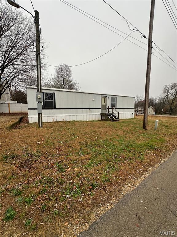 Cozy 2-bed, 1-bath single-wide on a convenient city lot—perfect for simple living or an investment opportunity. Easy access to town amenities, move-in ready and full of potential!
