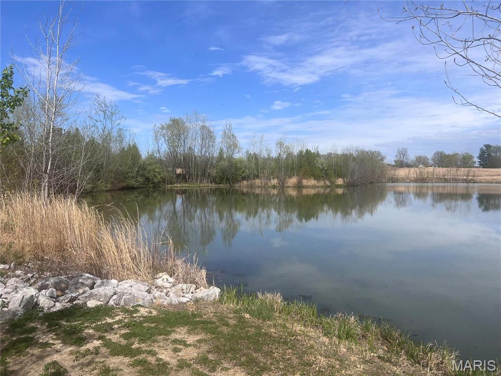 Two parcels are included in this listing. Parcel#19-1-08-01-00-000-003.002 (27.18 acres) and Parcel#19-1-08-01-00-000-011 (26.02 acres) Total acreage of 53.20 indicated on listing represent both parcels.
COMBINED TAXES YR 2023-$1,558.84. The 26.02 wooded acreage is in a 10-year Conservation Stewardship Plan and expires 4/25/28. The 27.18 Acres was a previous site for The Methodist Church that has since been torn down. The lake was designed for use as a detention basin for the church and a 42-lot subdivision they were planning to develop. This is an excellent piece of land for development or a private estate setting!
The buyer/buyer's agent should independently verify all listing data which is derived from various sources and not warranted as accurate. 
Agent Owned