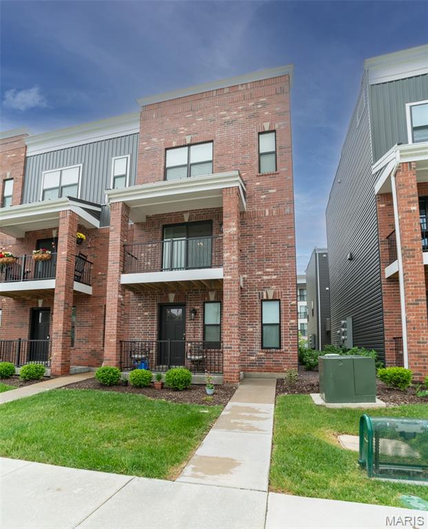 Recent construction, three-story townhome in historic Hill neighborhood of St. Louis: Ground floor has one-car rear-entry garage plus storage locker. First floor features open floor plan with kitchen-breakfast room, living room, and half bath. Kitchen boasts tall cabinetry, quartz countertops, stainless steel appliances, expansive center island with breakfast bar and pantry cabinet; wood flooring throughout. Third floor has two bedrooms with walk-in closets, plus full bath and separate laundry area. Deck adjacent to entry on ground floor, second floor balcony overlooks Rigazzi’s Restaurant. Walking distance to other local favorites including Milo’s, Vitale’s Bakery, Missouri Baking Company, Zia’s and more!