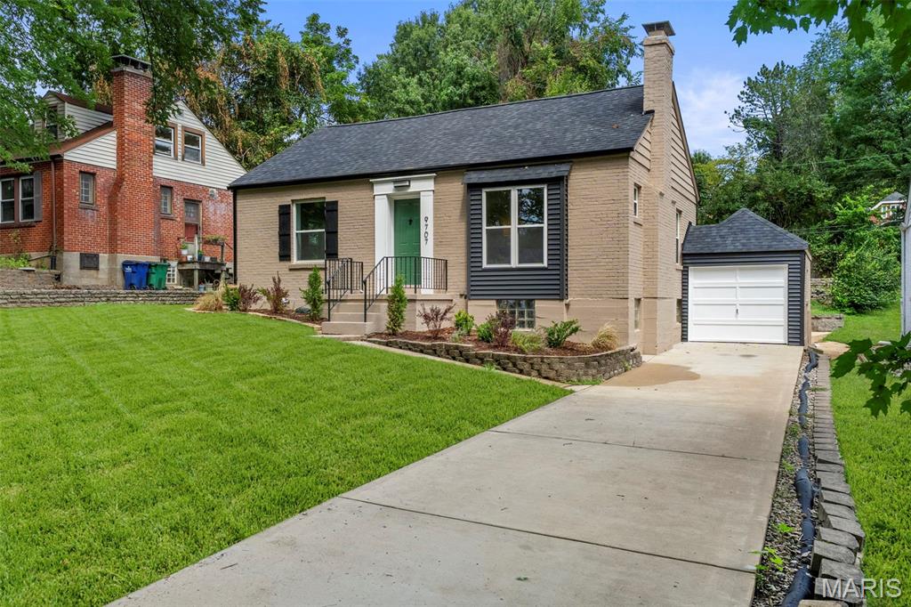 Welcome to 9707 Greenwood Terrace, a beautifully renovated 3-bedroom home in the heart of Rock Hill/Webster Groves! Step inside to discover a bright, inviting interior featuring fresh neutral finishes, recessed lighting, stylish flooring, and an open flow perfect for everyday living and entertaining. The charming front living room showcases a fireplace, elegant crown molding, and an arched opening leading into the dining room. The updated kitchen offers abundant white cabinetry, stainless-steel appliances, modern countertops, and a striking tile backsplash. The spacious rear room serves as the third bedroom but could easily transition into a comfortable family room, home office, playroom, or entertaining space. The renovated bathroom features contemporary black fixtures and a beautifully tiled tub and shower surround. Outside, enjoy attractive curb appeal, fresh landscaping, a long driveway, detached garage, patio area, and a large backyard with plenty of room to relax or entertain. Conveniently located near shopping, dining, parks, and everything Rock Hill and Webster Groves have to offer. Completely refreshed and ready for its next owner—schedule your showing today! Back on market through no fault of seller.