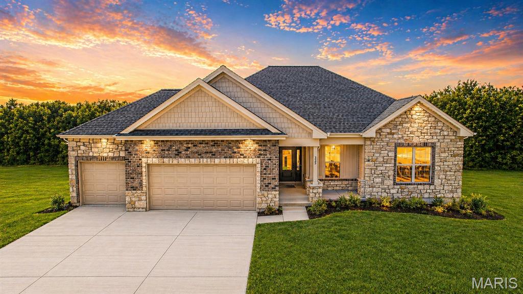 Back to trees, loaded with upgrades, and located in one of Washington’s most desirable communities, this new construction home in Stone Bridge is exactly what today’s buyers are searching for.

Step inside and you’ll immediately notice the high ceilings and open, airy feel that make this home stand out. The main living space is designed for both everyday living and entertaining, anchored by a stunning kitchen featuring quartz countertops, modern finishes, and plenty of space to gather. 
The luxury primary suite delivers the retreat buyers want, with a spacious layout and high-end feel that makes it easy to unwind at the end of the day.

Downstairs, the finished lower level adds serious value and flexibility with an additional bedroom, full bath, and large rec room—perfect for guests, entertaining, or a private living space.

Outside, enjoy one of the most sought-after features in Stone Bridge: a backyard that backs to trees, offering privacy, peaceful views, and a setting that’s hard to find in new construction.

With a 3-car garage, modern design, and a prime location close to parks, walking trails, and everything Washington has to offer, this home checks every box.

If you’ve been waiting for the right home in Stone Bridge, this is it. 
Stone Bridge, by Northern Star Homes.