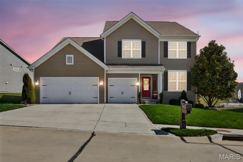 Welcome to a truly exceptional home where pride of ownership shines at every turn. Impeccably maintained & thoughtfully curated, this 4 BR, 2.5 BA residence offers 3,800+ SF of total living space & presents like a model home. From the moment you enter, you’ll notice the elevated craftsmanship, extensive upgrades & pristine condition that delivers a magazine-worthy aesthetic where every space is as beautifully styled as it is functional.

The main level showcases refined architectural touches including crown molding throughout, custom doors & hardware. Natural light floods the space throughout with upgraded Simonton windows with custom grills, complemented by designer window treatments. Every floor has been reinforced, leveled & upgraded with premium 12mm laminate flooring & high-end underlayment for comfort, insulation & soundproofing.

Modern comfort & efficiency features include dual-zone HVAC w/app-controlled thermostats, whole-home water filtration & softener & a Honeywell whole-house humidifier. Smart home enhancements include dimmable lighting throughout, custom LED installations, mobile-controlled basement lighting, fiber internet w/dual Wi-Fi routers & a fully wired security camera system.

Step inside the welcoming foyer, which opens to an open den/office at the front of the home with architectural detailing. Down the entry hallway, the layout opens into the spacious family RM, anchored by the corner fireplace & framed by the wall of windows. The family RM flows seamlessly into the dining area & the heart of the home—the kitchen—featuring luxury two-tone cabinetry, granite counters & premium KitchenAid appliances. A spacious walk-in pantry & nearby mud RM provide added storage & convenience.

Upstairs, a unique intermediate landing features a second office with custom L-shaped built-in desk & shelving overlooking the kitchen below. The upper level also includes a large secondary living area, 3 generously sized BRs with walk-in closets & a full bath. The primary suite is a private retreat with added sound insulation, a massive walk-in closet & a fully remodeled spa-like bath with custom luxury shower. The upstairs laundry RM is insulated for quiet operation.

The lower level offers a partially finished basement with large home theater room, egress window, exercise area, wine cooler & 2 storage rooms. A central vacuum system with garage-based unit adds convenience.

Outside, the custom stone patio features a full outdoor kitchen w/3 cooking stations (cross-infrared grill, 36” griddle & pellet smoker) & built-in mini fridge. Enjoy evenings by the stone fireplace w/matching wood storage. Professionally landscaped yard includes smart irrigation, mature trees & premium lot placement with morning sun & afternoon shade. 

Garage features epoxy-coated floors & fully finished walls/ceilings.

Located in the highly desirable Preston Woods subdivision, a scenic walking trail across the street leads directly to the neighborhood pool. The home is also part of the top-rated Wentzville School District & is conveniently close to shopping, restaurants & major highways, making downtown St. Louis accessible in about 30 minutes.

A rare opportunity to own a meticulously upgraded, exceptionally clean home that truly stands out—where luxury, comfort & thoughtful design come together effortlessly. You truly must see it to believe it.