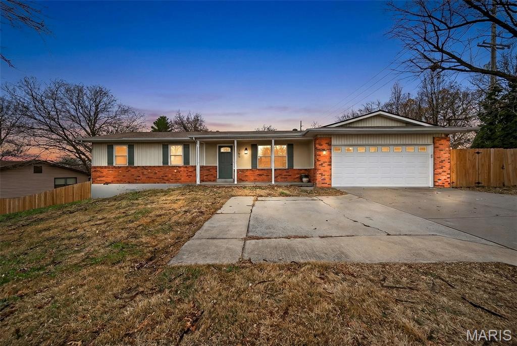 This beautifully renovated three bedroom, two bathroom ranch in the heart of St. Charles is a must see! The spacious, open floor plan features luxury vinyl flooring, fresh paint, and neutral tones. There are two living spaces, both with 9 foot ceilings. The living room at the front of the house has a large window, allowing for plenty of natural light. The den in the back of the home is a real show stopper with a beautiful brick fireplace and tongue-in-groove car siding ceiling. The kitchen in between is absolutely lovely. It's a chef/baker's dream with new appliances, 36 inch custom cabinets, built-in coffee bar, and a 6 foot island. The quartz countertops, tile backsplash, cabinet hardware, and new light fixtures add to the elegance of the eat-in kitchen. Down the hallway, you will find the primary en suite with new carpet and private bathroom. The private bath has a new vanity, flooring, and tiled shower. The second full bathroom has been completely renovated as well. Two spacious bedrooms round out the main floor. Looking for a little more space to hang out or entertain guests? Head on down to the partially finished basement. The basement is great for entertaining with a refurbished bar and repurposed cabinetry. It has great space for an entertainment area and pool table. The laundry area has been upgraded with drywall and shelving. The unfinished area of the basement offers the perfect about of space for storage and a workshop area with a walkout. The large backyard is made more intimate by a newer 6 foot privacy fence. The front landscaping has been updated with new bushes and evergreen tree. The exterior of the home has been further updated with tasteful, board and batten shutters; front door; and posts on the covered patio. In addition to the two car garage with newer opener, there is also an additional parking pad to allow for three cars to park in the driveway. Roof is newer and electric panel was just updated.Pictures are coming soon with showings to begin 12/11!