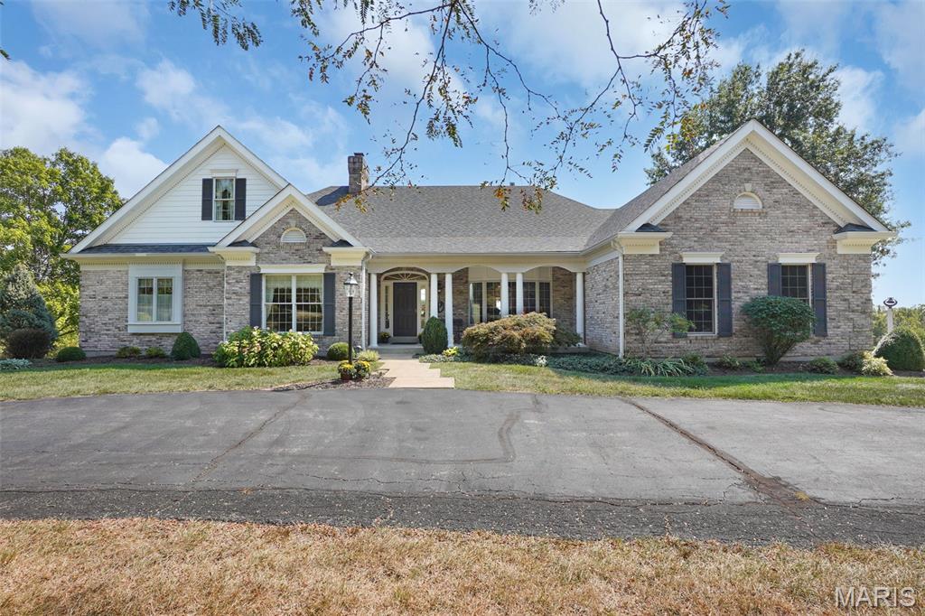 Executive atrium ranch style home w/lake, 20 acres & 2 outbuildings; located in Washington, MO, minutes from town! Home offers 3300 sq.ft. on the main level w/additional 2000 sq.ft. in the finished LL. Expectations run high as you enter the great room w/13' cove ceiling w/incandescing lighting, built in bookshelves & gas insert masonry fireplace. Only to be surpassed by the views out back of the lake and tranquil countryside! Formal dining room w/swing service door & bow window flows perfectly to the updated kitchen featuring GE Profile cooktop, double ovens, cherry cabinets, granite counter tops, planning desk, and Swanstone beverage sink. Sunlight sweeps you away to the bay window in the breakfast area which opens to a large deck, as well as the vaulted hearth room, w/2nd gas fireplace, opening on to another favorite spot on the screened in porch! Primary bedroom suite & adjoining nursery are tucked privately away, with 2 additional bedrooms that share a Jack and Jill bath and a secret passageway! Laundry room w/service full bath & a powder room complete the main floor. LL features a family room w/wet bar & 3rd gas fireplace; a private office w/built in desk and bookshelves; guest bedroom; full bath & laundry; pool table room; and exercise/dance room; plus, plenty of storage! Geothermal zoned HVAC, two 50-gallon water heaters, and new roof. 1500 sq.ft. machine shed #1 w/studio apartment and separate septic. 1680 sq.ft. machine shed #2 w/concrete & electric. NO RESTRICTIONS!