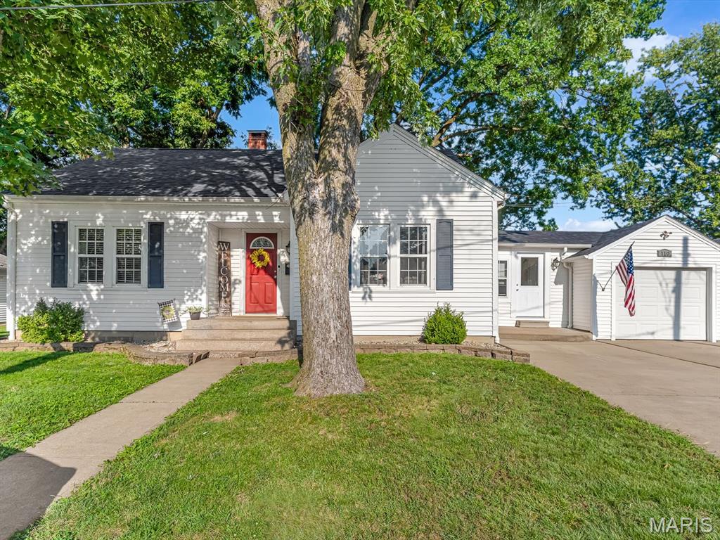 Welcome home to this well-maintained 1.5-story home in Red Bud with plenty of charm and great curb appeal! The main level features two bedrooms, a full bathroom, a spacious living room with beautiful hardwood floors, and a well-appointed eat-in kitchen with plenty of cabinet and counter space. A third bedroom is located upstairs, offering additional flexibility for guests, an office, or a private retreat.

One of the standout features is the convenient breezeway connecting the home to the attached one-car garage. Outside, you'll find a large driveway with plenty of parking, a back deck perfect for relaxing or entertaining, and a storage shed for all your extras. The unfinished basement provides excellent storage space and room for future use.

Located in a great Red Bud location, this home has been thoughtfully maintained and offers a comfortable layout with updates already taken care of.

Updates include: Dryer - 2024, Refrigerator - 2020, Dishwasher - 2019, Microwave - 2019, Water Filtration System - 2021, Water Softener, Roof - 2025, HVAC - 2019, Water Heater - 2018.