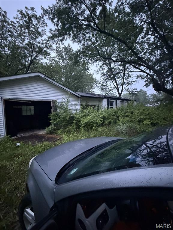 Potential rehab or tear-down and rebuild opportunity. Being sold at lot value. Motivated seller — bring your buyers. Plenty of building space with 100 feet of frontage. Must sign a hold harmless agreement prior to entering the property.