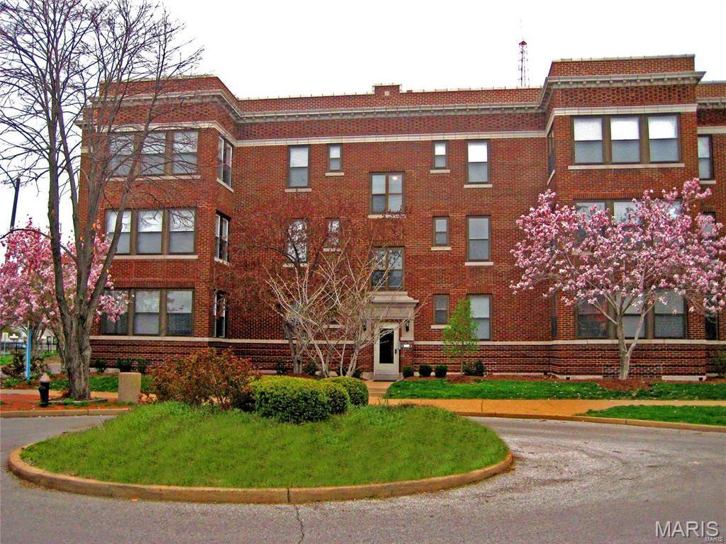 New Price!  What a great opportunity to own this lovely 2BD/2BA condo w/RARE 2 secured parking spaces in Debalivere Place Neighborhood on a closed off cul-de-sac in corner location! This gem is on the Washington University Bus Route! Let the sun shine through 17 windows! Nicely updated Kitchen includes granite counters, SS appliances, & 36” wood cabinets. Finishes include wood floors, 6 Panel Doors & Ceiling Fans. Enjoy the space of a large LR & Sep. DR/Breakfast Room. Updated Hall bath has ceramic tile surround & granite on vanity. Both bedrooms are good sized with great closet space. Master suite has beautiful en-suite bath w/2 separate sinks, granite counters, inlaid ceramic tile floors & ceramic surround in shower/tub. W15 x 14 covered deck offers a wonderful private outdoor space. Unit includes private storage in basement. Experience great proximity to all that Forest Park, Zoo, Colleges, Universities, Hospitals, & restaurants have to offer. Close to Metrolink! *Eligible for LiveNearYourWork@wustl.edu down payment assistance program!