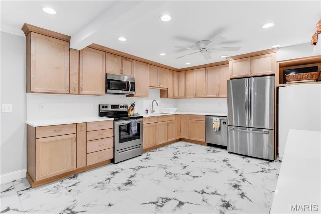 Just What You Have Been Looking For! Grade level Condo in an elevator building. Right here on the first floor is this completely updated & beautiful condo. Walls removed and now the flow thru this handsome place just makes sense. Solid surface flooring in the nice sized living space with fireplace, and two french doors that open to the patio. The dining room is expansive & light filled. The kitchen now!  Large, spacious with plenty of storage and counter space.  Lots of light, upgraded appliances, Extra room for a freezer (which remains, if you choose.)  Full sized washer/dryer are located in a dedicated space. The 3 (count them 3!) bedrooms are on one side of the condo. Full second beautifull pdated bathroom found here too!  The master bedroom has a large walk-in closet, with closet organizing system. Lovely bathroom (, lovely!) with elegant appointments.  The master bedroom is actually larger than most any you can find. Windows overlook the backyard. This condo has been completely updated in the sellers 6 years of ownership. Electric, flooring, all cabinetry, kitchen, bathrooms...the whole she-bang. Walk out of your french doors to a grade level patio. This seller has a green thumb and has gorgeous plantings at the back of the unit and the back fence. Annuals, as well as perinials. And this condo has windows that overlook this from every room.  Now, as said this is a elevator building. One floor down is the garage. This unit has one parking space that comes with the purchase. There is also a nice sized storage unit. found in the garage. You use your lock for security. Perfect for storing holiday decorations. The building has a secure door from the outside, with a buzzer type door bell. You just buss your guest in from the foyer. There are two pools, a tennis court and a pickleball court. Easy access to shopping and major roadways. This is one fabulous opportunity that hits on all cylindars. Updated, check. Chesterfield, check. Ground floor, check. 3 bedrooms, check.  This just might be the best deal in town.