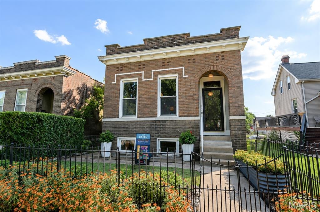 This meticulously maintained home in Boulevard Heights is ready for you to move right in!  The sellers are delighted to share that the neighbors are friendly and welcoming and this quiet one-way street is located just a block a way from both the Greenway trail and Carondelet park.
From the picture perfect entry garden, you'll be greeted by a light filled entryway and enter into a beautiful living area with a vintage fireplace and decorative mantle. The large dining room offers endless possibilites to fit your lifestyle and the kitchen is a dream of wide open spaces with a functional freestanding island. The first floor is completed with a large primary bedroom, second bedroom/office, and fully remodeled bath with bonus closet.  There are also Washer Dryer hookups in the main floor bath as well as in the lower level, and you may choose the arrangement that best fits your needs! 
Downstairs we have added a third bedroom with window egress and second half-bathroom, lounge area,  plus a large workshop and bench in the laundry area. The rear garden is fully fenced with plenty of shade.  
Don't miss this Boulevard Heights Jewel Box!!