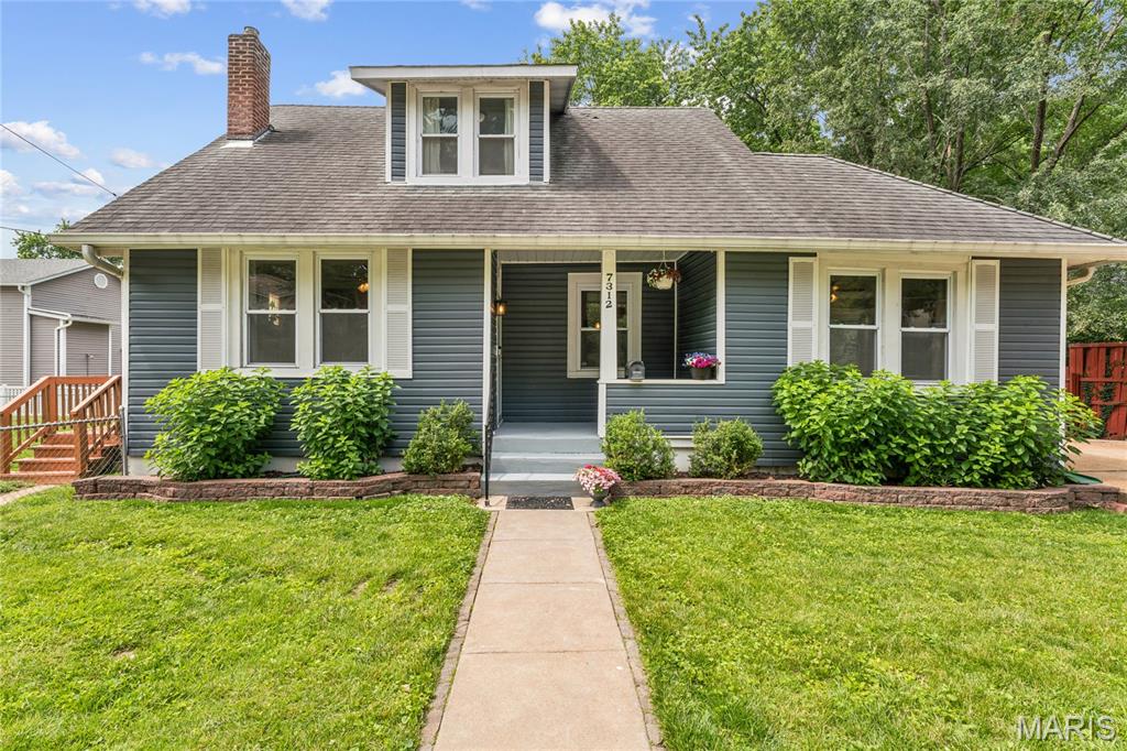Tucked into one of Maplewood’s most beloved neighborhoods, 7312 Esplanade feels like the kind of home that instantly invites you to slow down and stay awhile. With 4 bedrooms, 3 full baths, rich hardwood floors, and warm, welcoming spaces throughout, this home beautifully blends everyday comfort with timeless character.

The heart of the home flows effortlessly from room to room, while the finished lower level creates the perfect spot for gathering, complete with a projector ready for cozy movie nights, big game watch parties, or rainy Sunday afternoons at home. Step outside and you’ll find both a deck and patio, offering plenty of space for morning coffee, summer dinners with friends, or simply enjoying a quiet evening under the trees.

And when you’re ready to explore, some of Maplewood’s favorite local spots are just moments away, from dinner at Piccadilly at Manhattan to craft beers at Schlafly Bottleworks or brunch at The Blue Duck. This is more than just a house; it’s the kind of place where life feels a little fuller, neighbors become friends, and home truly feels like home.