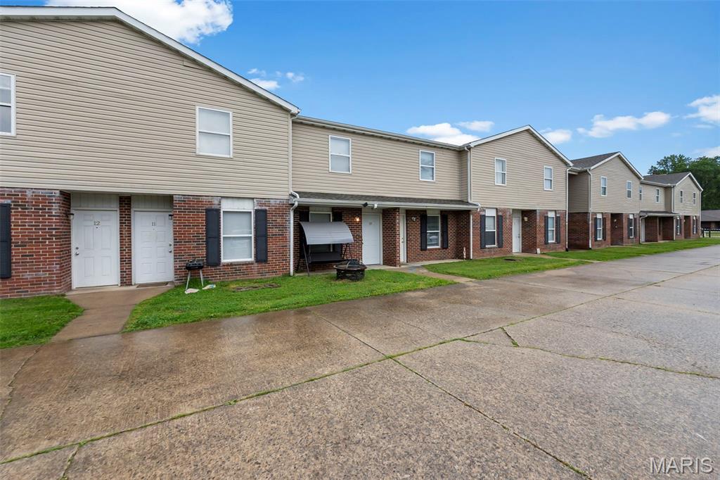 Excellent opportunity to acquire a fully occupied, cash flowing multifamily investment property in a highly convenient central location. This 12 unit complex features spacious 2 bedroom, 1.5 bathroom units, each equipped with in unit laundry, offering the amenities today's tenants are looking for. With strong occupancy and established rental income, this property provides immediate cash flow while also presenting potential value add opportunities for increased returns. Whether you're looking to expand your portfolio or secure a stable income producing asset, this well maintained multifamily property is an investment worth considering.