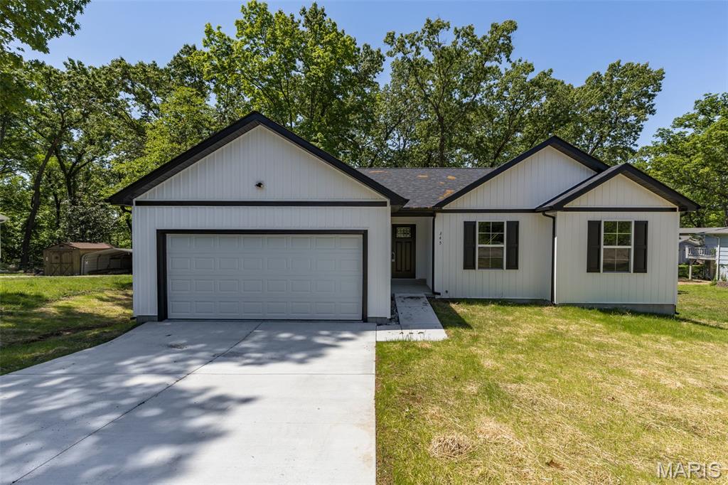 Back on the market-no fault of the sellers, buyers got cold feet.
BRAND NEW HOME!  Discover modern comfort in this beautifully crafted new-construction ranch home offering 1,347 sq ft of thoughtfully designed living space with a full walkout basement. Nestled on a .78-acre wooded lot, this home combines privacy with contemporary style.
The open main level features luxury vinyl plank flooring throughout and a welcoming layout perfect for everyday living and entertaining. The kitchen is a standout with stylish gray cabinetry, a center island with breakfast bar, pendant lighting, and stainless-steel appliances, flowing seamlessly into the breakfast room.  
Enjoy outdoor living on the spacious rear deck, complete with black iron spindles and railings, overlooking the peaceful wooded setting. Additional highlights include main-floor laundry, a two-car garage, patio and carriage-style interior doors that add a touch of character throughout the home.
With quality finishes, functional design, and serene surroundings, this new ranch home is the perfect blend of luxury and comfort—ready for you to make it your own.  Backs to mature trees!  THIS HOME IS A DREAM COME TRUE!