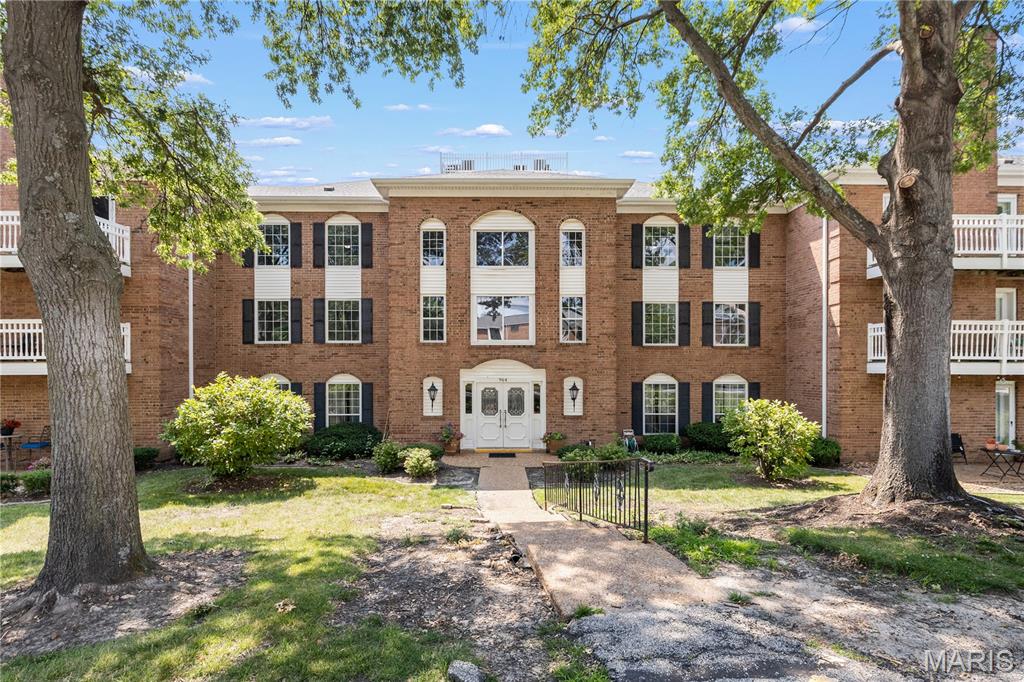 Welcome to 964 Claytonbrook Drive #2B in Ballwin. Totally RENOVATED in 2023, this 2nd floor corner unit features a wonderful OPEN Floor Plan with almost 1800 square feet. A gracious Entry Foyer leads into the Living Room with access to the large, covered deck and SUNSET VIEWS. The Living Room is OPEN to the Kitchen, Dining Room, and Den. The Updated kitchen features white cabinetry, solid-surface countertops and backsplash, a center island, Stainless-Steel appliances, and direct access to the Dining Room. A Large Den off of the kitchen could be converted to a 3rd bedroom. Down the hall are the 2 Large Bedrooms and 2 Full Bathrooms including the spacious Primary Suite.  IN-UNIT Laundry. All appliances included. NEW Windows and Patio Doors (2024). HVAC (2018).  1 assigned garage parking space and a large (17'x12') storage unit across from the garage ALL ACCESSIBLE from the ELEVATOR. Gorgeous, renovated lobby with secure entry. Rockwood Schools (Marquette), close to restaurants, & shopping. Access to subdivision pool available for additional fee. Ballwin amenities include The Pointe at Ballwin Commons, North Pointe Aquatic Center & Ballwin Golf Club & Events Center.
