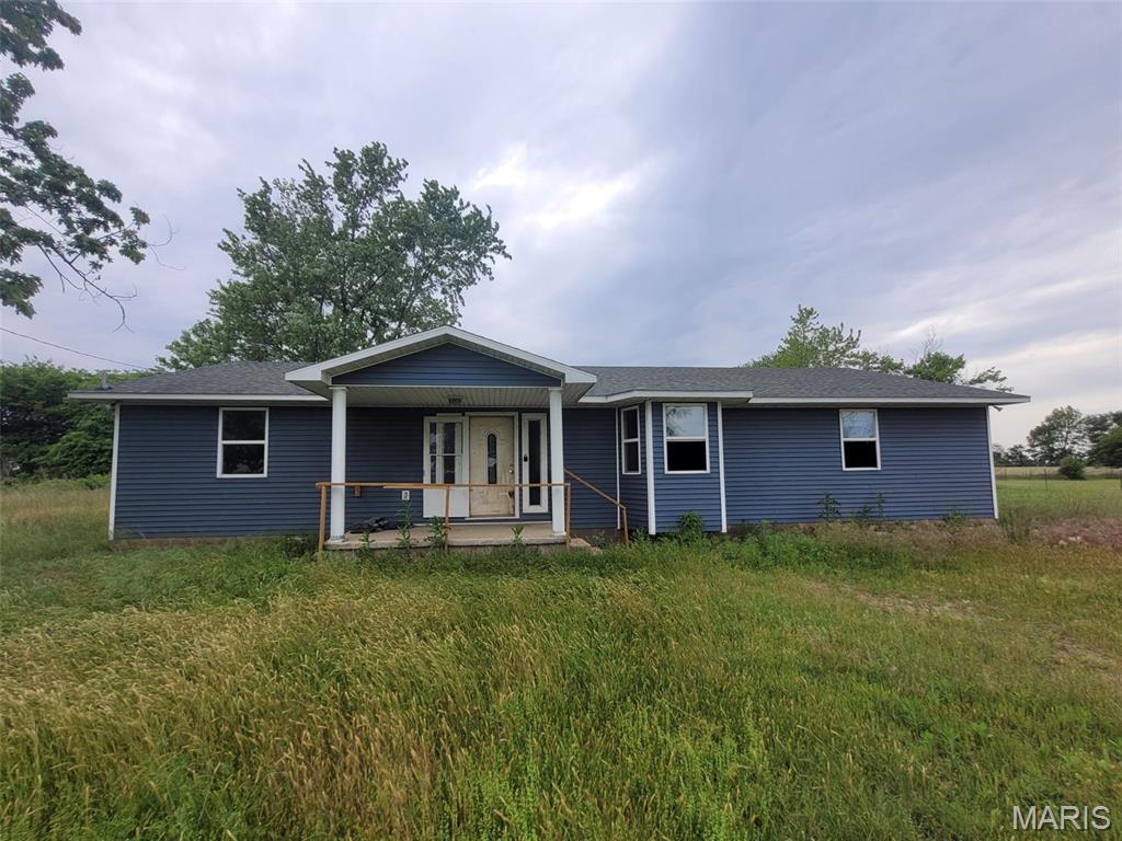 Tucked away on 3.75 acres and set back off the road, this spacious 4-bedroom home offers privacy, room to roam, and endless potential! With a large layout and peaceful country setting, this property is perfect for buyers looking for space both inside and out.

The home features a covered front porch, roomy bedrooms, and a flexible floor plan ready for your personal touch. Outside, you’ll love the open acreage with plenty of room for a garden, shop, animals, recreation, or simply enjoying the quiet surroundings. The secluded setting gives you the feel of country living while still being within a convenient drive to town.

Whether you’re searching for an investment opportunity, fixer upper, or a place to create your dream home, this property has the space and setting to make it happen. Bring your vision and see the possibilities this acreage property has to offer!