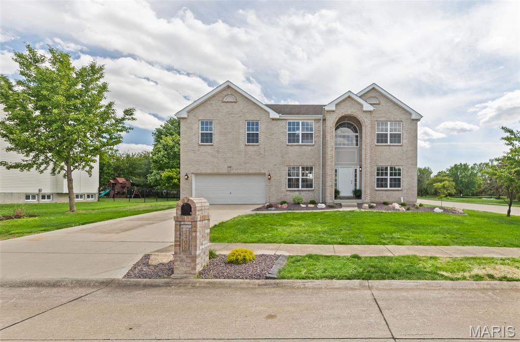Completely renovated with meticulous attention to detail, this stunning 4 bedroom, 4 bathroom home offers the perfect blend of modern luxury, thoughtful design, and unbeatable convenience! Situated on a desirable corner lot just minutes from Scott Air Force Base, shopping, interstate access, and highly sought-after O’Fallon schools, this property truly checks every box. Step inside to discover all new LVP flooring, fresh carpeting, new paint and trim, and stylish new lighting throughout. The beautifully updated kitchen is a true showstopper featuring brand new cabinetry, gorgeous quartz countertops, and the perfect space for cooking, gathering, and entertaining. Each bathroom has been thoughtfully refreshed with new vanities and modern fixtures, creating a polished and cohesive feel throughout the home. The massive primary suite is a true retreat, offering generous space, a large walk-in closet, and a luxurious private bath complete with dual vanities, a separate soaking tub, and walk-in shower. Every bedroom offers private bathroom access, providing exceptional comfort and convenience for family or guests. Upstairs, a spacious loft adds incredible flexibility for a second living area, home office, or playroom. Cozy up by the fireplace in the inviting main living space or step outside to enjoy the new landscaping and patio—perfect for relaxing or entertaining. The unfinished basement offers endless possibilities for future expansion, storage, or customization to fit your needs. This home combines beauty, space, function, and location with quality updates throughout—an exceptional opportunity you do not want to miss! - Agent Owned.