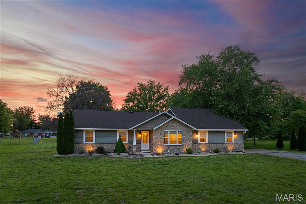 Looking for a spacious 3 bed 2.5 bath retreat on 1.6 acres in the Triad school district with an in-ground pool? Welcome home! This beautifully designed home offers an open floor plan with recessed lighting, a sunken living room with a wood stove, and a well-appointed kitchen featuring a breakfast bar and a full suite of SS appliances. A mudroom off of the garage with laundry hookups adds convenience. The versatile dining/rec area is perfect for entertaining and opens to the pool through sliding doors. Enjoy your primary suite with walk-in shower, along with an updated full bath with soaking tub and a refreshed half bath. Loft with skylights & bonus room offer flexible space. Enjoy your private outdoor oasis with a stunning kidney shaped 9 ft deep pool with dusk to dawn lighting, pergola, additional covered area, composite deck, and privacy fence. Garage with 2 new doors, long driveway and shed offer great storage.  Updates include stone veneer, siding, soffits, gutters, guards 2024 tankless water heater 2022, some windows, newer pool pump, and encapsulated crawl space with sump pump warranty provided.  Quiet cul-de-sac