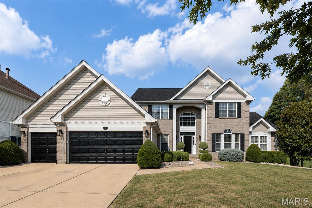 Stunning 1.5 story, 6 beds & 5.5 bath home with over 5,400SF of luxury living space is exactly what you're looking for! The main floor features hardwood floors throughout, a spacious two story great room w/gas fireplace and tons of natural light is open to the breakfast area, kitchen and den. Gorgeous eat in kitchen w/custom cabinetry, gas cooktop, quartz counters, stainless appliances, dual ovens, huge eat in center island, tile backsplash and 2 walk in pantries! The kitchen is open to the newly renovated den with another gas fireplace and walks out onto the oversized patio and flat yard. The vaulted main floor primary suite has hardwood floors, a huge walk in closet with custom organizers and island, updated indulgent bath, w/walk-in glass shower, soaking tub & dual vanity. Bonus room with glass french doors & dining room flank the entry. Upper level: 2 bedrooms each with their own ensuite bath & walk in closets on the opposite side of the upper level are 2 additional bedrooms and a full hall bath. Lower level is perfect for entertaining w/a large rec room, new kitchenette/bar with ample cabinet space, full size black stainless dishwasher, fridge with ice maker and sink, bedroom with large walk-in closet, full bath, large playroom, tons of storage and a sauna! Large MF laundry/mud room with built-ins and sink, NEW Roof, gutters & fascia, 3 car garage, 3 zoned HVAC!!, fresh paint throughout, ample off street parking. Walk to Fairway Elementary School, enjoy the neighborhood pool, walking trails, lake and easy access to Wildwood Town Center & more.