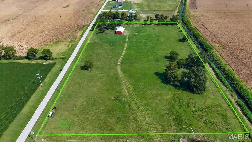 Discover the possibilities with this 14± acre property located in the Kelly School District. Fully fenced and offering plenty of open space, this property provides an excellent opportunity to create your own private ranch, homestead, or full country compound.

The property features a hay barn as well as a feed building with its own well, with approximately half of the building featuring a concrete floor. With existing agricultural improvements already in place and ample acreage to work with, there is plenty of room for a future home, shop, additional buildings, livestock, equipment, and more.

Whether you’re looking for a place to build your dream home and ranch setup or simply want acreage with existing infrastructure, this property offers a great starting point with room to make it your own.