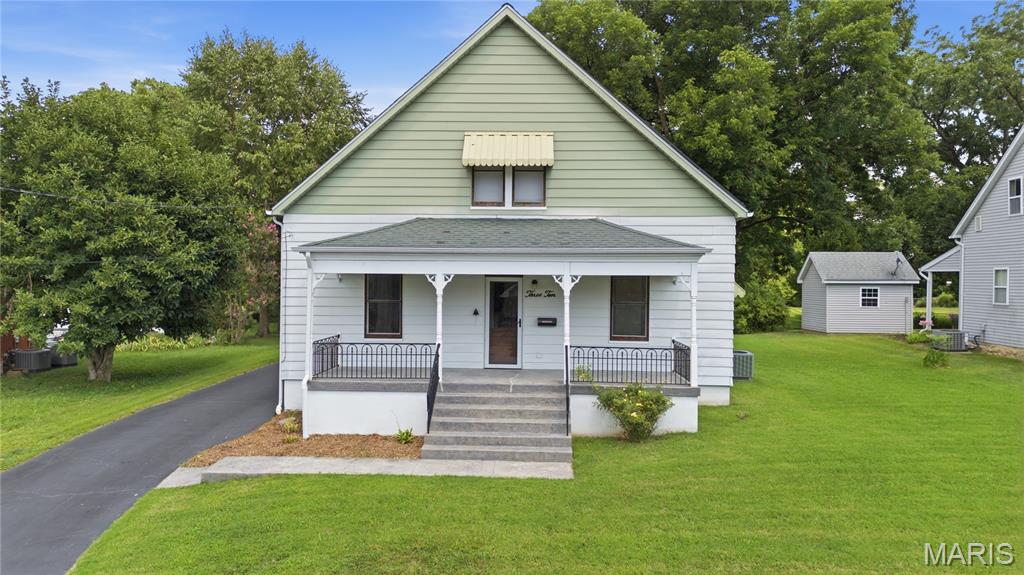 2nd chances don't come often, but you are in luck with this home! This charming 3 BR, 2 Bath Bungalow is in mint condition & ready to meet its new owners!  From the moment you pull up, you will love the full front covered porch welcoming you in the front door with the soaring ceilings & impeccable hardwood floors!  The spacious kitchen showcases a full set of appliances, corian counters, built in pantry area & ample room for your dining table! The main level also plays host to two plentiful bedrooms & a remodeled full bath! On the upper level, you'll appreciate the impeccable wood work, tall vaulted ceilings, abundance of storage, loft area (could be more sleeping space), & huge 3rd bedroom.  Don't forget about the basement with extra bath & washer/dryer.  The transferable solar system keeps utilities at a minimum.  For outdoor enthusiast, the backyard offers endless possibilities for entertaining, pets, play, & gardening!  The covered back porch & large concrete patio (with hook ups in place for both hot tub & natural gas grill), are great spots to setup seating areas to enjoy your private views of the Legion Park in your backyard.  The oversized garage features two bays for parking with a 3rd side bay to encompass any additional storage you need!  Only blocks from historic downtown Main St, don't miss out in this well-kept home! Home has passed the Columbia Inspection!