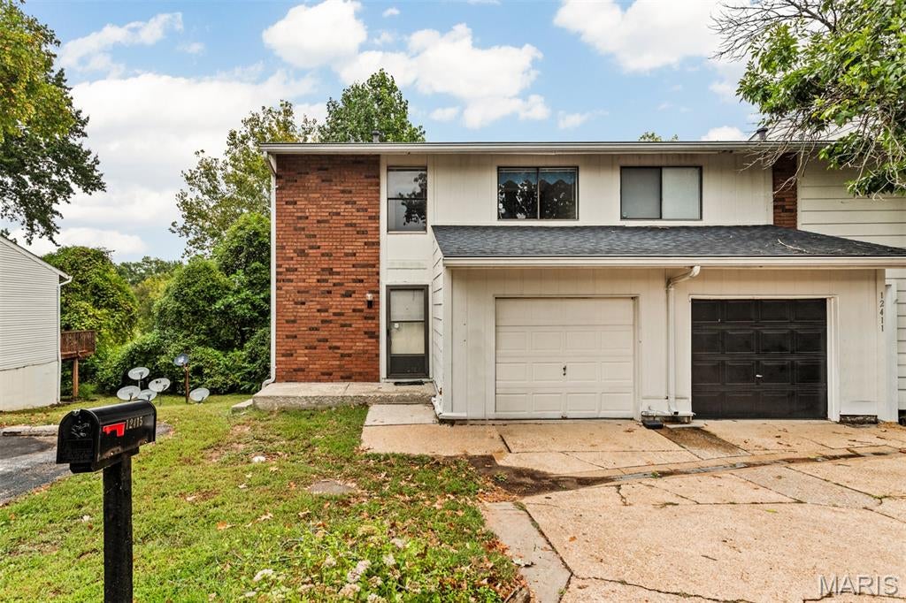 Fantastic opportunity to own this 3 bedroom, 2.5 bath townhouse located in Paddock Forrest! Well maintained by the same owners for 29 years! The open living & dining rooms have large sliding glass doors that open to the deck overlooking a lake on the common ground. The kitchen and a half bath are also located on this level. The open staircase leads to the second level with 3 bedrooms, 2 full baths all with large closets. The spacious basement is unfinished with another set of sliding glass doors leading to a patio. There's a laundry room & plenty of space for storage. Newer furnace and air conditioner. 1-car attached garage w/ opener. Seller's are selling as-is, but may offer credits for repairs found during buyers inspection.