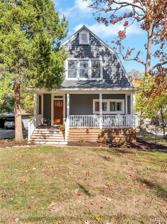 Welcome to 633 N Forest Avenue, a stunning 5-bedroom, 4-bath Dutch Colonial beauty with over 4000 sq ft of finished living space located in the heart of Webster Groves! This beautifully renovated home inside and out is the perfect blend of timeless charm and modern functionality. The inviting front porch sets the tone for relaxed living and friendly gatherings. Step inside to find a large foyer and cozy living room, opening seamlessly into a light-filled and expansive kitchen, dining, and family room. The chef’s kitchen boasts a large quartz-topped center island and breakfast nook. The Scullery will make this home stand out from the rest servicing as a second kitchen/mudroom.  The large deck overlooking the 1/3-acre yard is perfect for entertaining or simply enjoying your private backyard retreat, complete with an oversized 2 -car garage. 

Upstairs, the luxurious primary suite offers a true escape large enough to offer a nice sitting area with a huge walk-in closet and spa-like en-suite bath. Three additional bedrooms and two full baths offer plenty of space for family or guests. Complete with a second-floor laundry room to make taking care of the family needs effortless. 

The finished lower level provides even more living space with a large entertainment space and fifth bedroom - making it perfect for a home gym, media room, or guest suite. All of this just steps away from the best dining, shops, and charm of downtown Webster Groves -this home truly has it all!